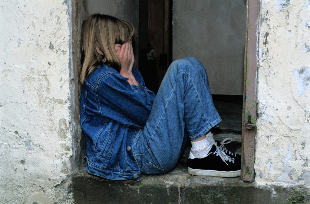 A picture containing building, person, outdoor, cellphone

Description automatically generated