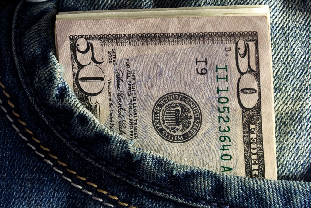 A close-up of a dollar bill

Description automatically generated with low confidence